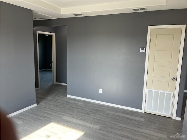 121 N Kentucky St, Mission, TX 78573 - spare room featuring baseboards and wood finished floors