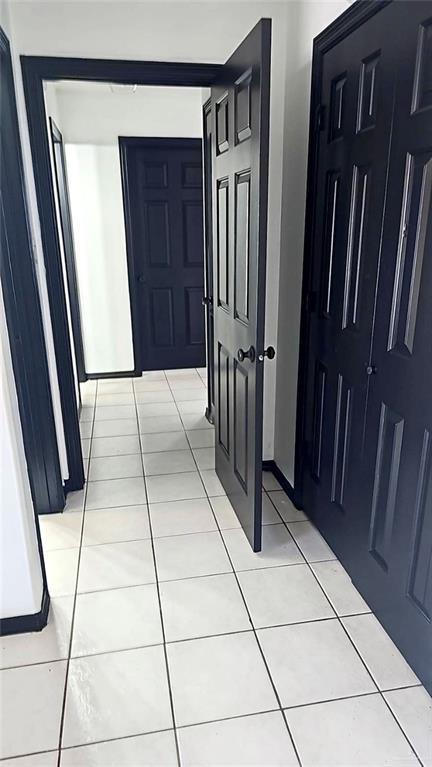 1417 Prosperity Dr, Edinburg, TX 78541 - hall featuring light tile patterned floors