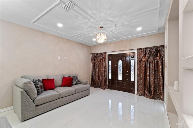 foyer entrance with an inviting chandelier