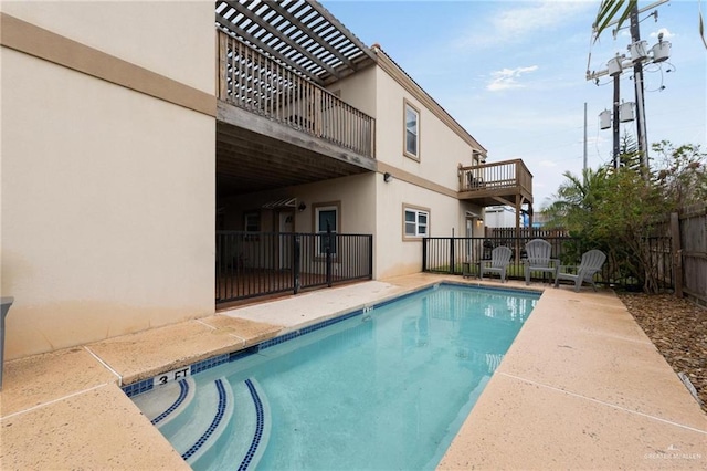 103 W Dolphin St Unit 1B, South Padre Island, TX 78597 - view of swimming pool with a patio area, a fenced backyard, and a fenced in pool