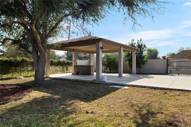 view of yard featuring a gazebo and a patio