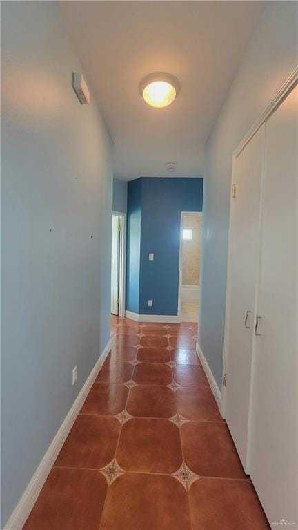 hallway featuring tile patterned floors