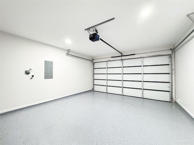 garage featuring a garage door opener and electric panel