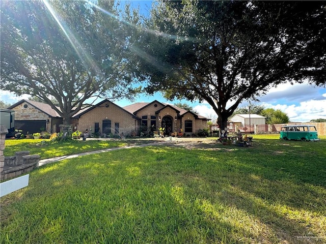 ranch-style house with a front yard