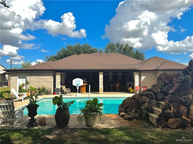 view of pool with a patio