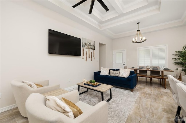 living room with ceiling fan with notable chandelier, ornamental molding, and coffered ceiling