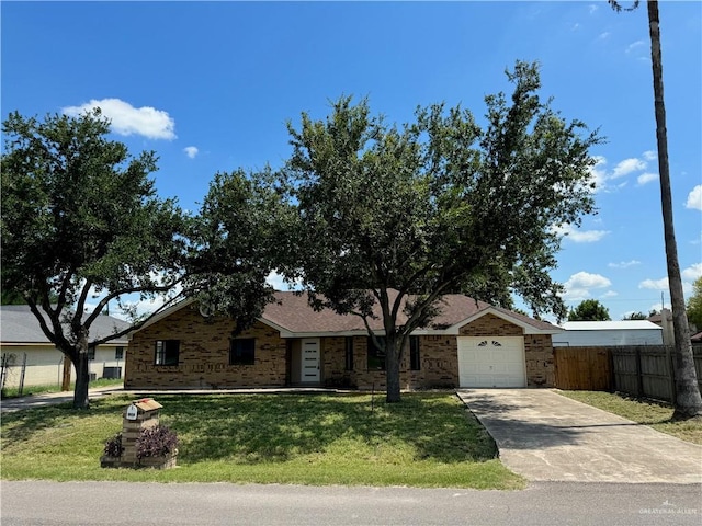 ranch-style house with a front lawn and a garage