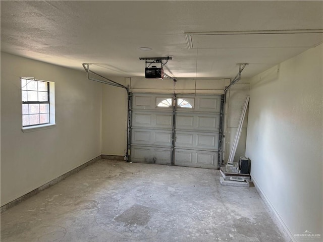 1401 Royola St, Mission, TX 78572 - garage with baseboards and a garage door opener