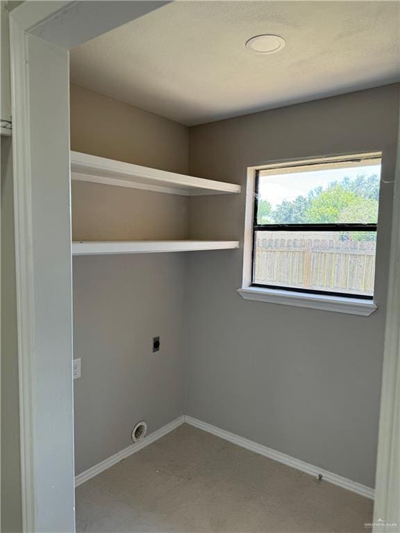 laundry area with electric dryer hookup