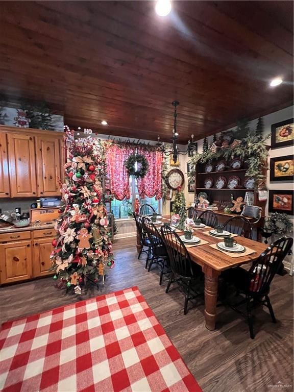 unfurnished dining area featuring wooden ceiling and dark wood-type flooring