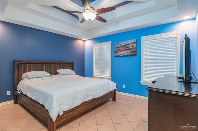 4116 N Flores St, Edinburg, TX 78541 - bedroom with a tray ceiling, light tile patterned floors, baseboards, and ceiling fan