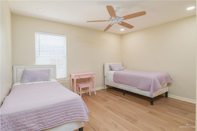 4116 N Flores St, Edinburg, TX 78541 - bedroom featuring light wood finished floors, baseboards, recessed lighting, and ceiling fan