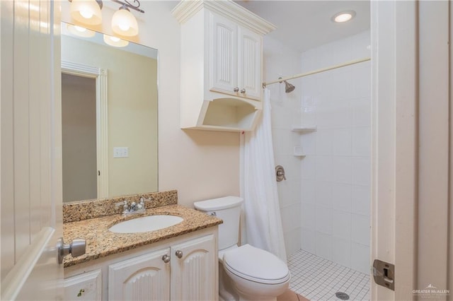 4116 N Flores St, Edinburg, TX 78541 - full bath with toilet, a tile shower, and vanity