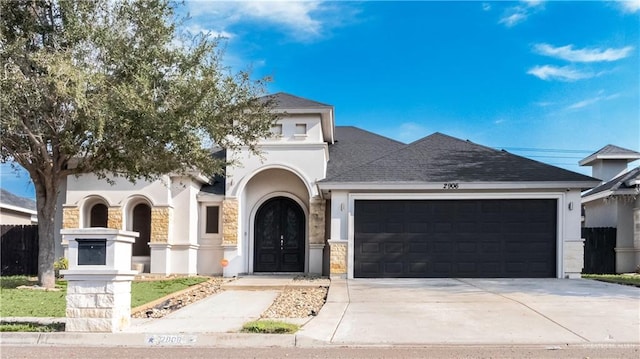 view of front of property with a garage