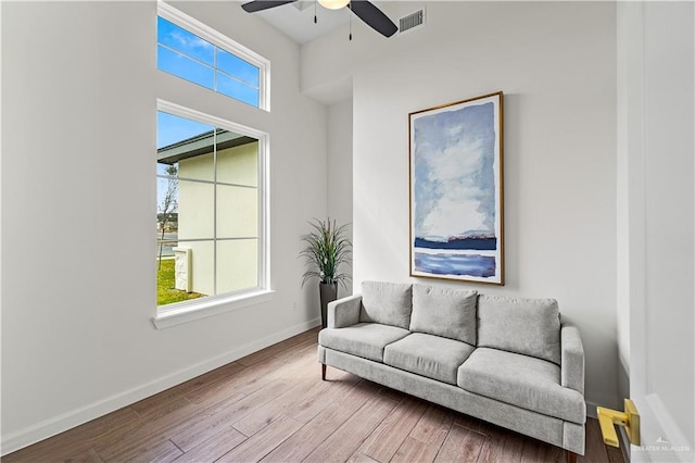 interior space featuring ceiling fan, light hardwood / wood-style flooring, and a wealth of natural light