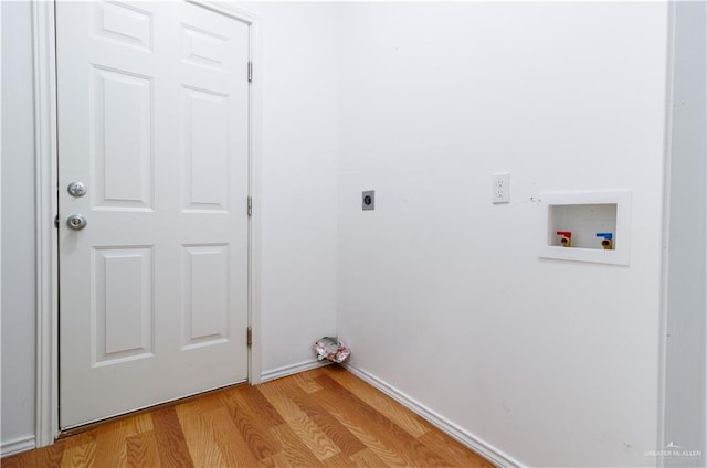 laundry area with hookup for an electric dryer, light wood-type flooring, and hookup for a washing machine