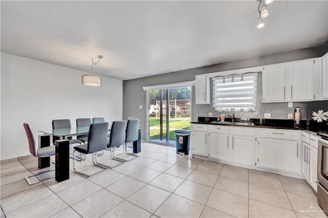 2201 S Jackson Road I Unit 7, Pharr, TX 78577 - dining space featuring light tile patterned flooring
