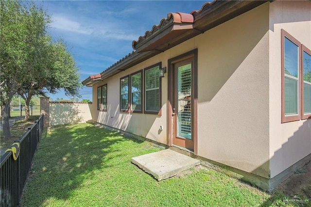 view of yard with a fenced backyard