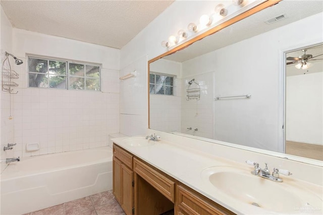 2109 E 28th St, Mission, TX 78574 - full bathroom with double vanity, visible vents,  shower combination, and a sink
