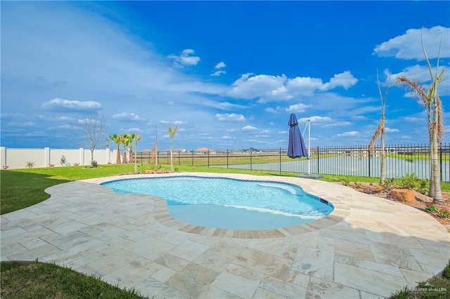 view of pool featuring a patio, a yard, a fenced backyard, and a fenced in pool