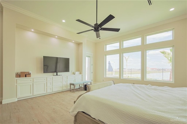 bedroom featuring recessed lighting, light wood-type flooring, and crown molding