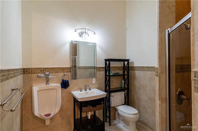 bathroom featuring an enclosed shower, sink, tile walls, tile patterned flooring, and toilet