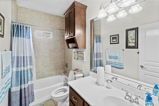 full bath featuring tile patterned floors, shower / tub combo with curtain, vanity, and toilet