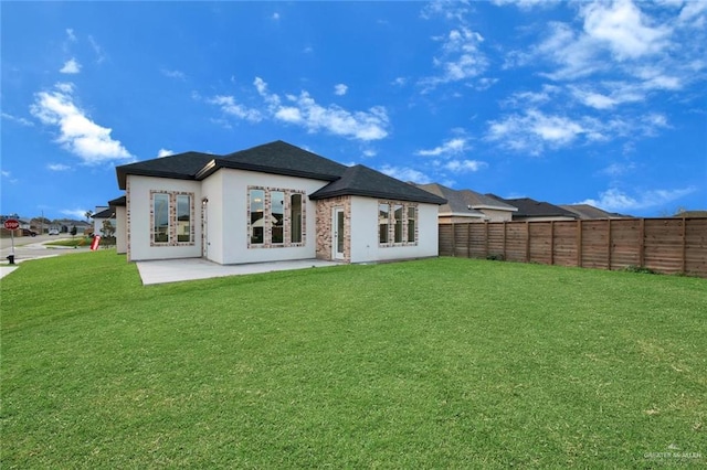 4012 Burr Dr, Edinburg, TX 78542 - rear view of house with a fenced backyard, a patio, french doors, and stucco siding