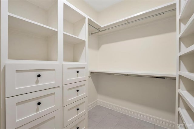 4012 Burr Dr, Edinburg, TX 78542 - walk in closet featuring light tile patterned floors