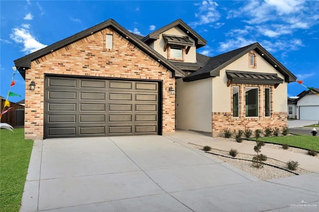 4012 Burr Dr, Edinburg, TX 78542 - view of front facade featuring brick siding, concrete driveway, a garage, stucco siding, and roof with shingles