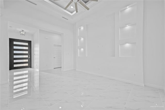 entrance foyer featuring a ceiling fan, marble finish floor, a towering ceiling, and baseboards