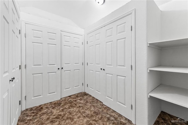 8907 Other, San Antonio, TX 78242 - hall featuring dark colored carpet and vaulted ceiling