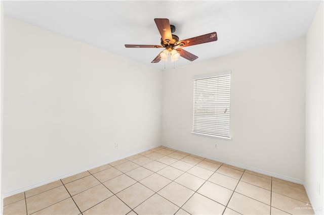 8907 Other, San Antonio, TX 78242 - spare room featuring a ceiling fan, light tile patterned flooring, and baseboards
