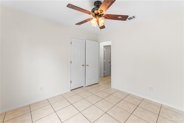 8907 Other, San Antonio, TX 78242 - spare room with a ceiling fan, baseboards, and light tile patterned floors