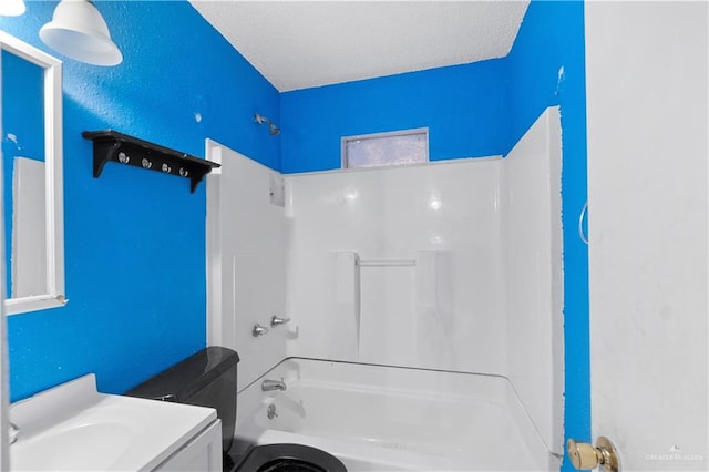 bathroom with vanity and washtub / shower combination
