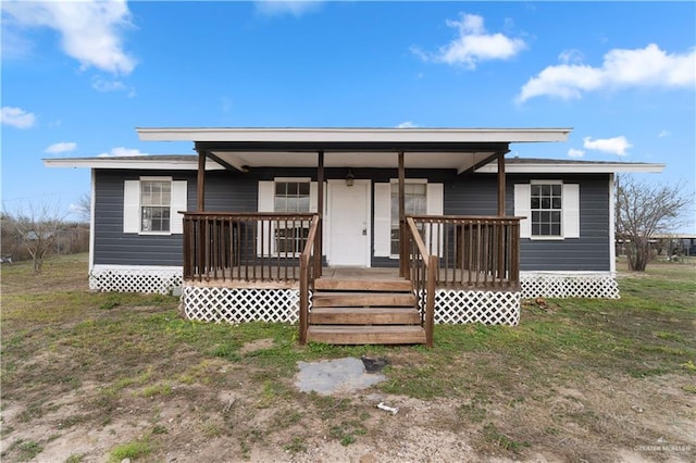 view of front of home with a front yard