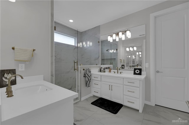 bathroom featuring vanity and a shower with shower door