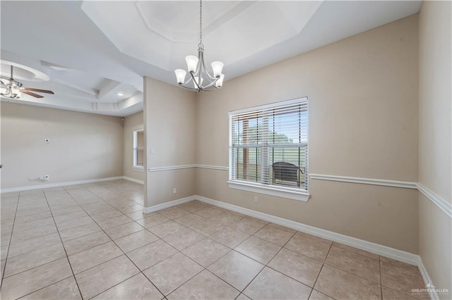 unfurnished room featuring light tile patterned flooring, a raised ceiling, and ceiling fan with notable chandelier