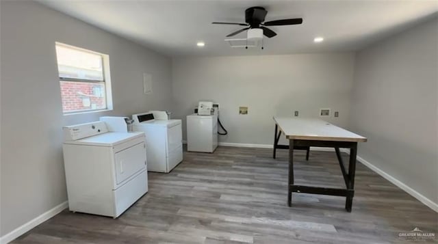 washroom with ceiling fan, washer and clothes dryer, and hardwood / wood-style floors