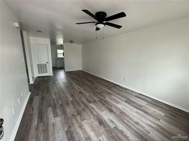 2504-2606 N M Rd, Edinburg, TX 78542 - unfurnished living room featuring ceiling fan and dark wood finished floors