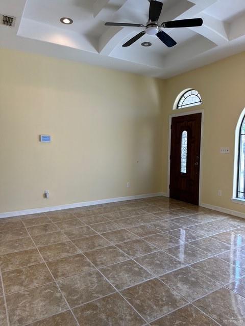 1502 W Kennedy Ave, Alton, TX 78573 - foyer with plenty of natural light, coffered ceiling, a towering ceiling, baseboards, and recessed lighting