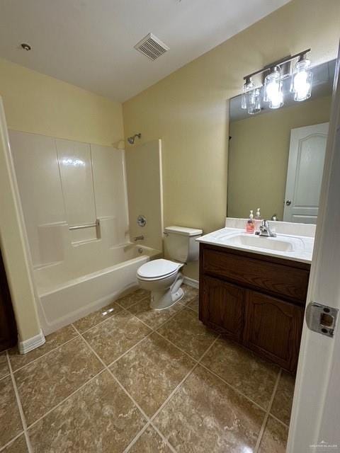 1502 W Kennedy Ave, Alton, TX 78573 - bathroom featuring vanity, toilet,  shower combination, and tile patterned flooring