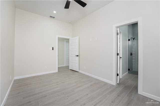 unfurnished bedroom featuring light wood finished floors, recessed lighting, visible vents, and baseboards