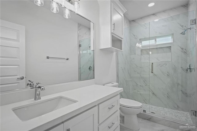 bathroom with vanity, a marble finish shower, recessed lighting, toilet, and marble finish floor