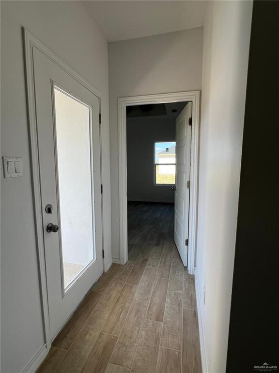 hallway featuring light hardwood / wood-style flooring