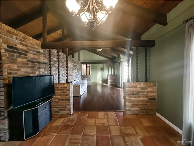 unfurnished living room with a chandelier, wood-type flooring, and vaulted ceiling with beams