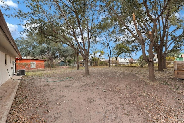 view of yard featuring central AC unit