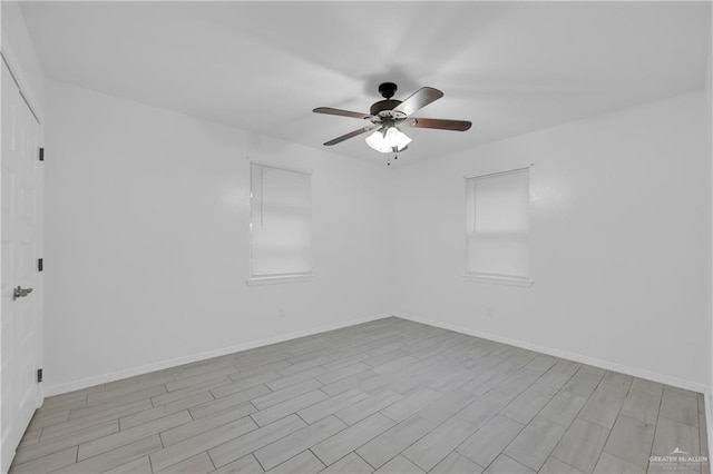 empty room featuring ceiling fan