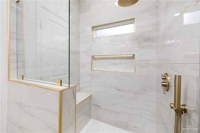 820 N Trinity St, Edinburg, TX 78541 - bathroom featuring a marble finish shower