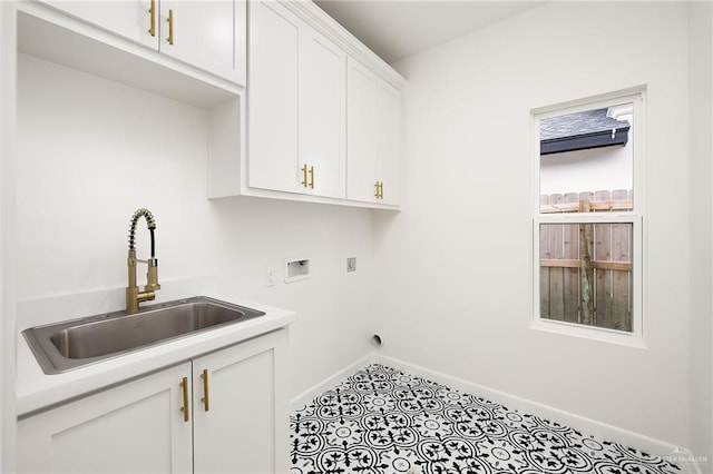 820 N Trinity St, Edinburg, TX 78541 - washroom with cabinet space, electric dryer hookup, and washer hookup